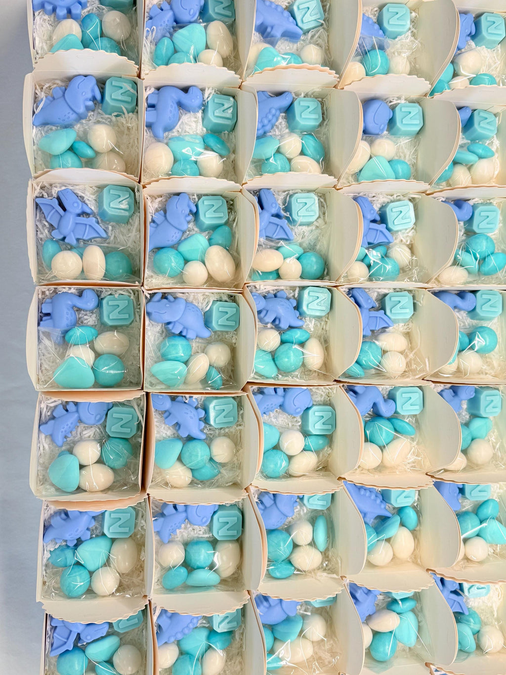 Mixed Dinosaur Soap + Letter" with box, sugared almonds, and personalized tag